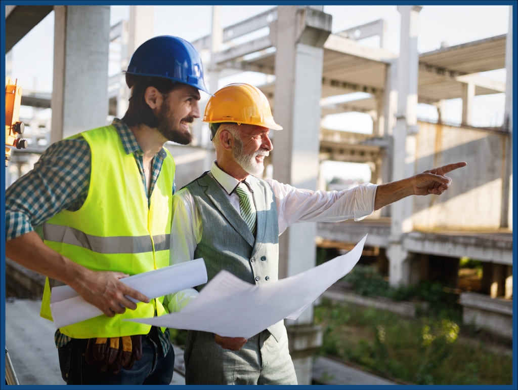 Construction workers reviewing plans